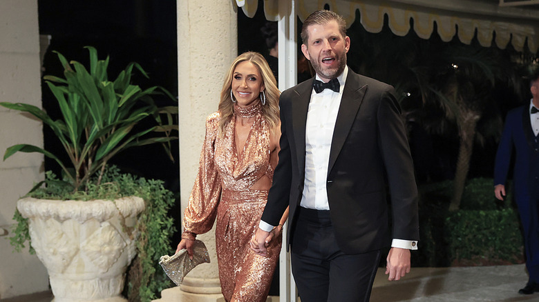 Lara Trump and Eric Trump walking hand in hand
