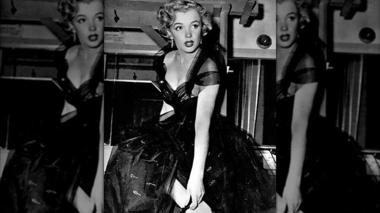 Marilyn Monroe wearing the 1951 Oscars black tulle gown