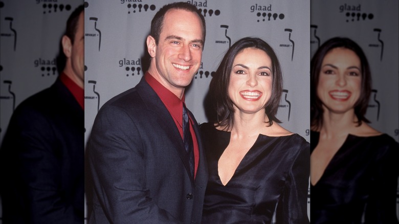 Mariska Hargitay wearing a black v neck dress with matte makeup
