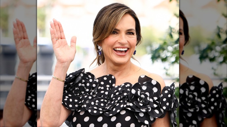 Mariska Hargitay wearing a polka dot dress with large blue diamond earrings