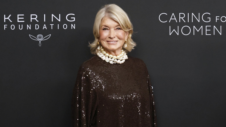 Martha Stewart in a brown sequin dress with a pearl necklace