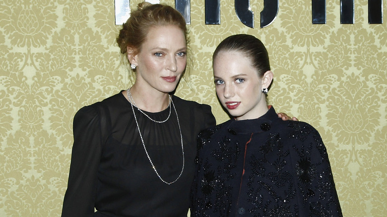 Uma Thurman and Maya Hawke attend the Miu Miu Resort Collection 2015 in Paris