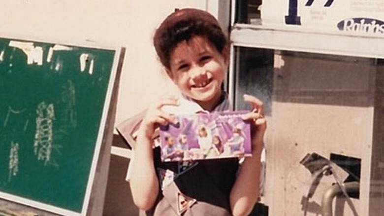 A young Meghan Markle in her girl scout uniform