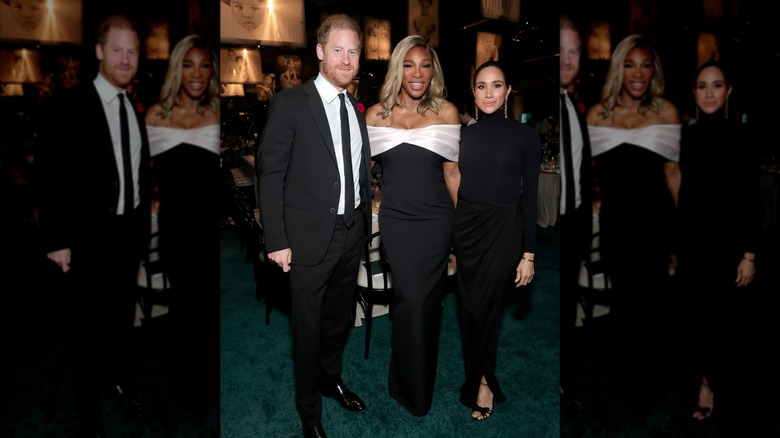 Meghan Markle posing with Prince Harry and Serena Williams while wearing bow-adorned heels