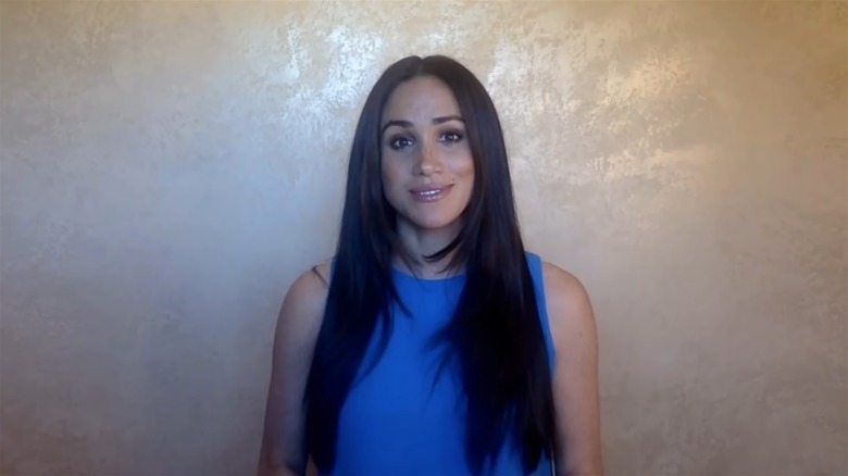 Meghan Markle with long straight hair