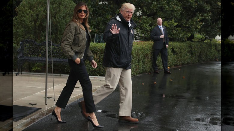Melania and Donald Trump leaving the White House with Melania in black heels
