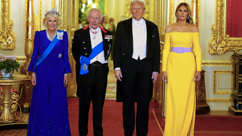 King Charles with Queen Camilla standing with Donald and Melania Trump for the state visit in 2025