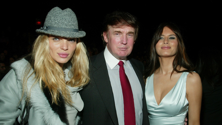 Melania Trump with Donald Trump and another woman at an event