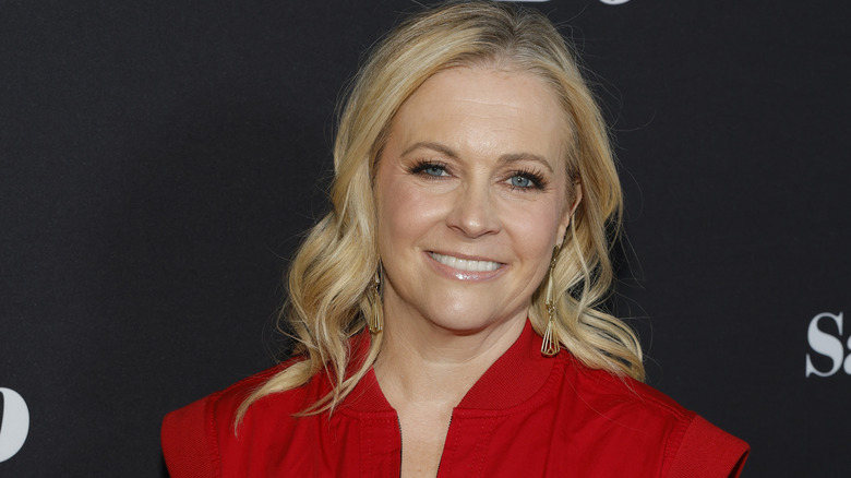 Melissa Joan Hart smiles on the red carpet in 2026