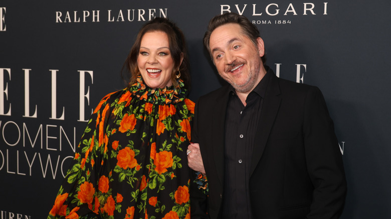 Melissa McCarthy and her husband actor Ben Falcone attends Elle Women In Hollywood 2025 at Four Seasons Hotel Los Angeles at Beverly Hills on November 17, 2025 in Los Angeles, California