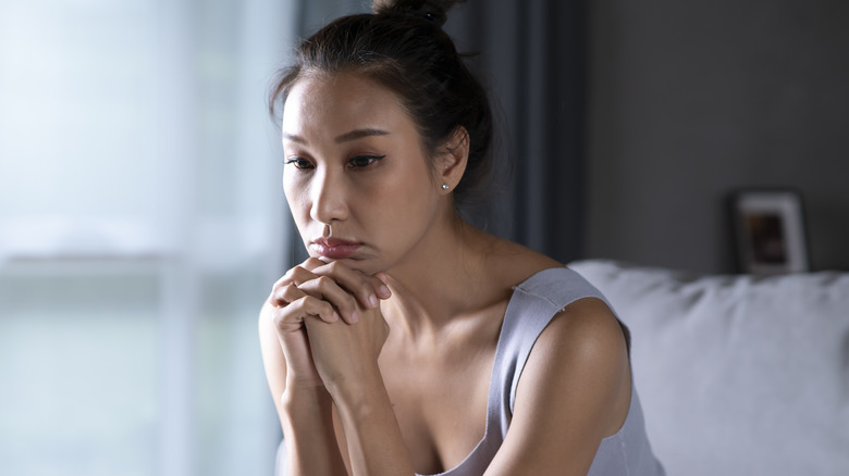 Woman lying awake in bed