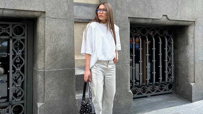 Woman in metallic pants