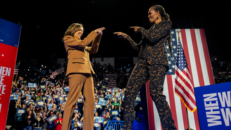 Michelle Obama points at former Vice President Kamala Harris