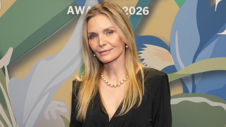 Michelle Pfeiffer poses backstage during the 2026 Fragrance Foundation Gala