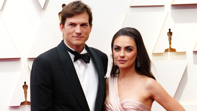 Ashton Kutcher and Mila Kunis attend the 94th Annual Academy Awards at Hollywood and Highland on March 27, 2022