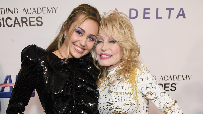 Miley Cyrus and Dolly Parton at the MusiCares Person of the Year, 2019