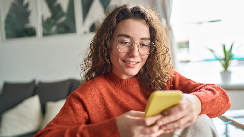 A young woman on her phone 