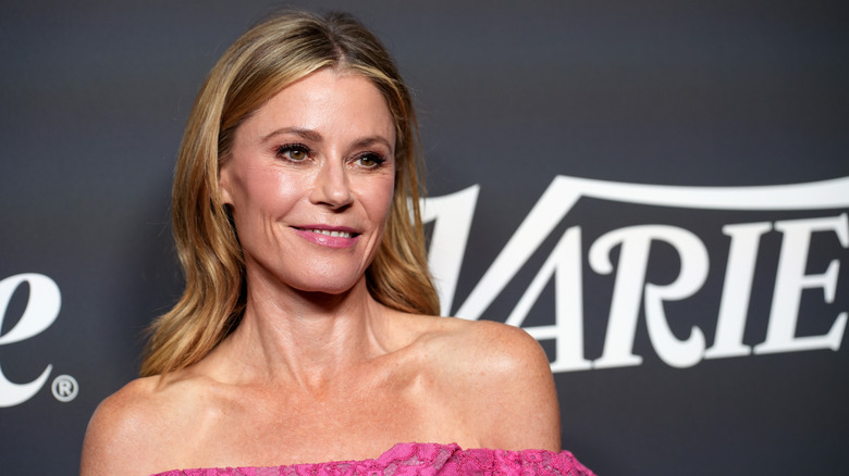 Julie Bowen in a pink off-the-shoulder dress at an event