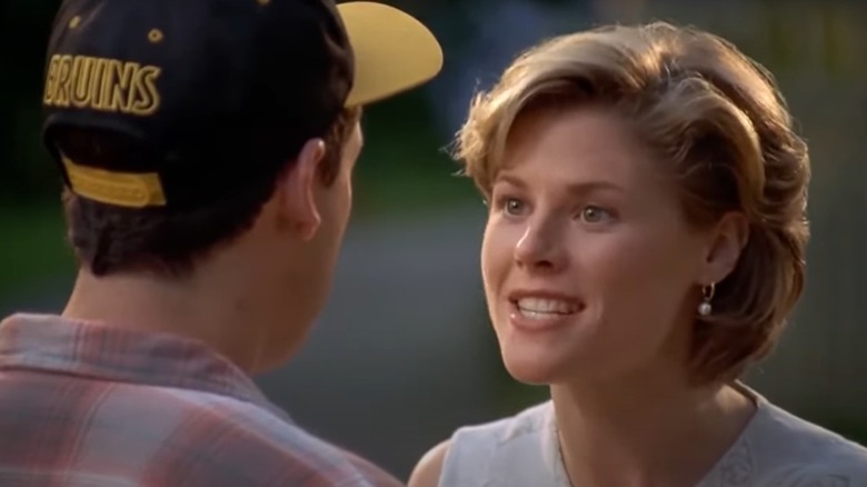 Julie Bowen acting alongside Adam Sandler in "Happy Gilmore"