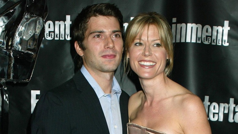 Julie Bowen and Scott Phillips smiling together on the red carpet