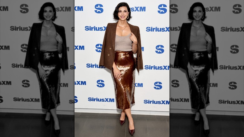 Morena Baccarin smiles on the red carpet in 2024