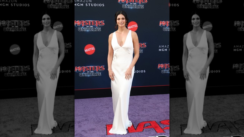 Morena Baccarin smiles on the red carpet in 2026