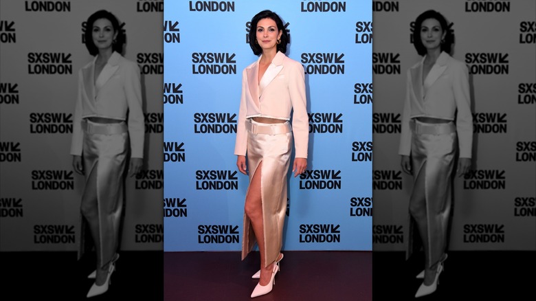Morena Baccarin smiles on the red carpet in 2025