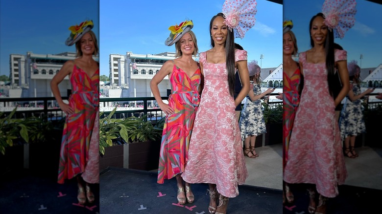 Dylan Dreyer positng next Sanya Richards-Ross at a race track