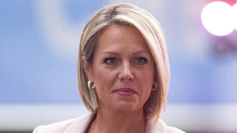 Dylan Dreyer with a side part and a pink blazer