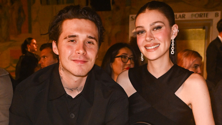 Brooklyn Beckham and Nicola Peltz attend the Balmain Womenswear Spring-Summer 2025 show as part of Paris Fashion Week