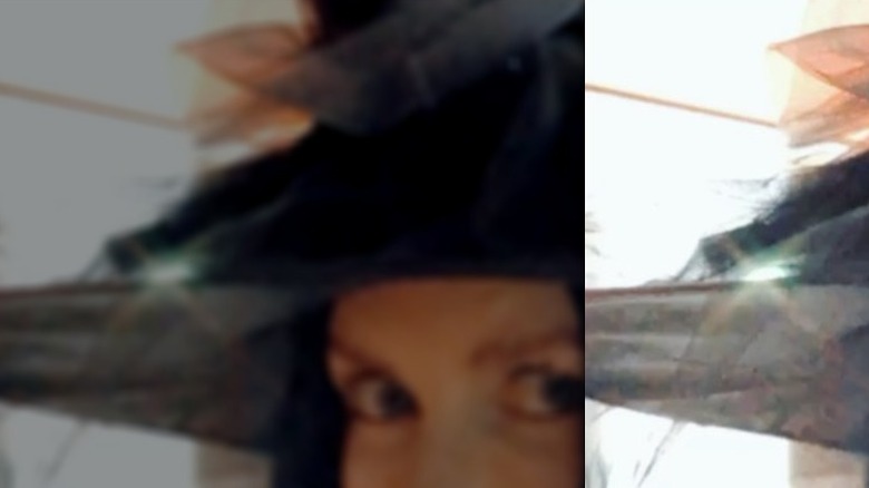 Nicole Kidman wearing a black wig