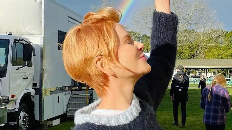 Nicole Kidman wearing a short, red wig