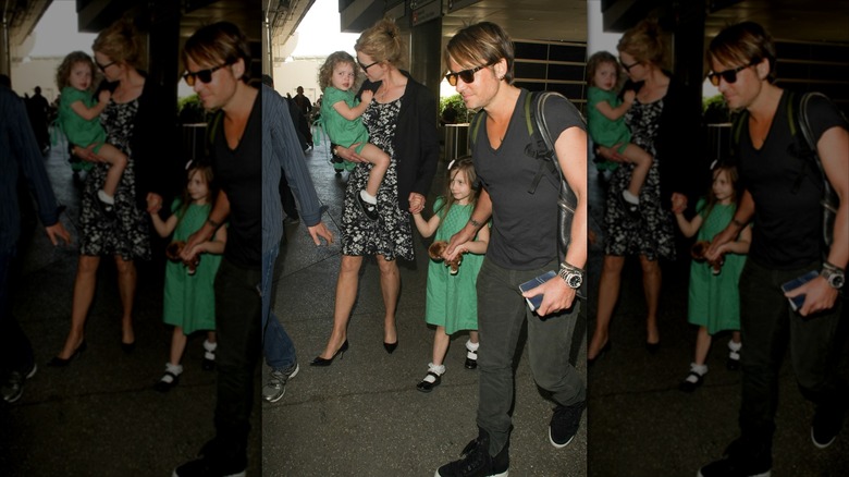 Nicole Kidman and Keith Urban walking with their kids