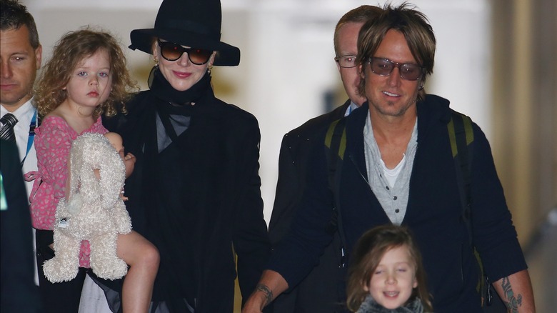 Nicole Kidman and Keith Urban walking with their kids