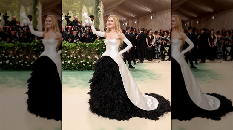 Nicole Kidman at the Met Gala in a black and white gown with a full bell skirt