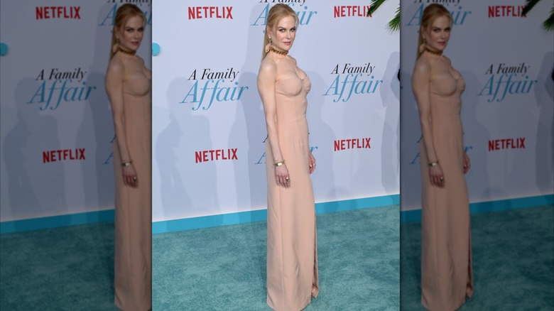 Nicole Kidman in a beige dress at an event