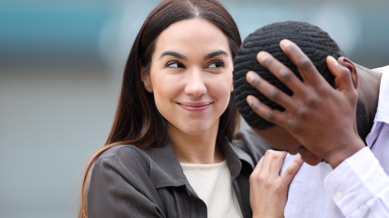 woman smiling with man