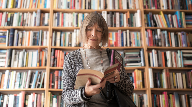 Woman reading in a book store
