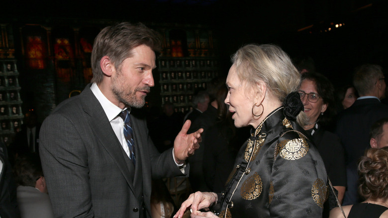 Faye Dunaway at the premiere of HBO's Game of Thrones Season 6 wearing a black jacket and scrunchie