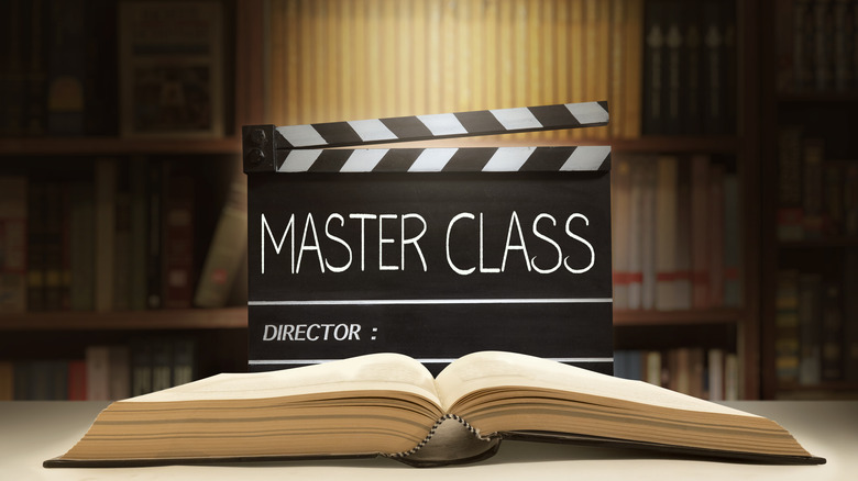 Film slate with book