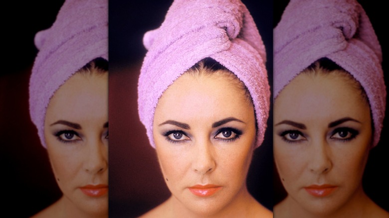 Elizabeth Taylor circa 1960s with her hair wrapped in a towel