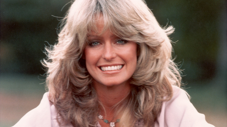 Farrah Fawcett smiling during a 1970s photoshoot