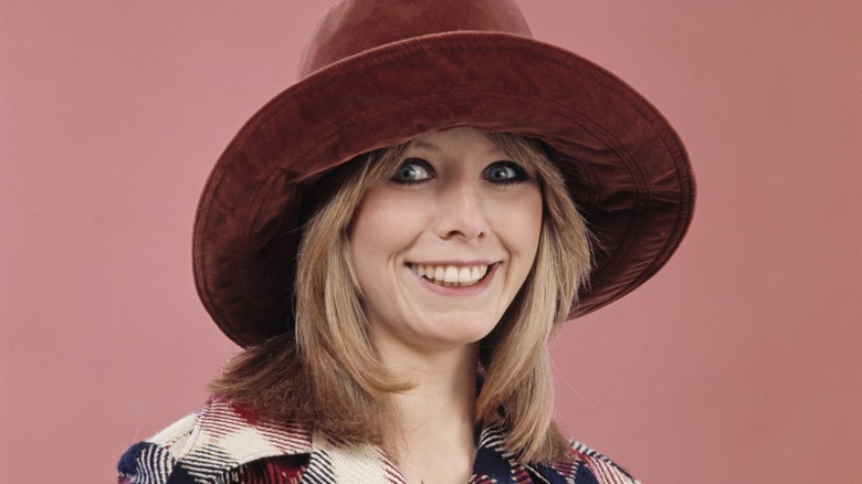 A model wearing heavy eyeliner in the 1970s