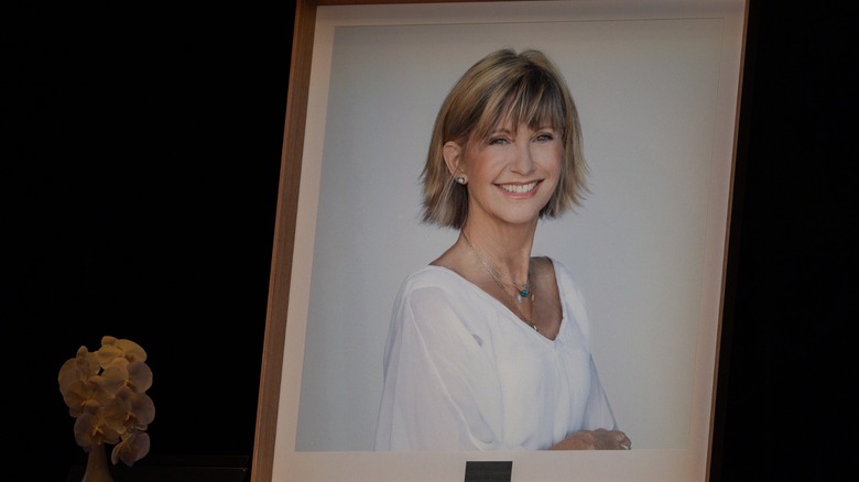A framed photo of Olivia Newton-John on display at a memorial service for the star