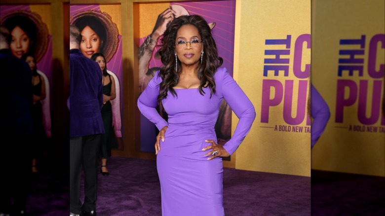 Oprah Winfrey wearing a purple dress