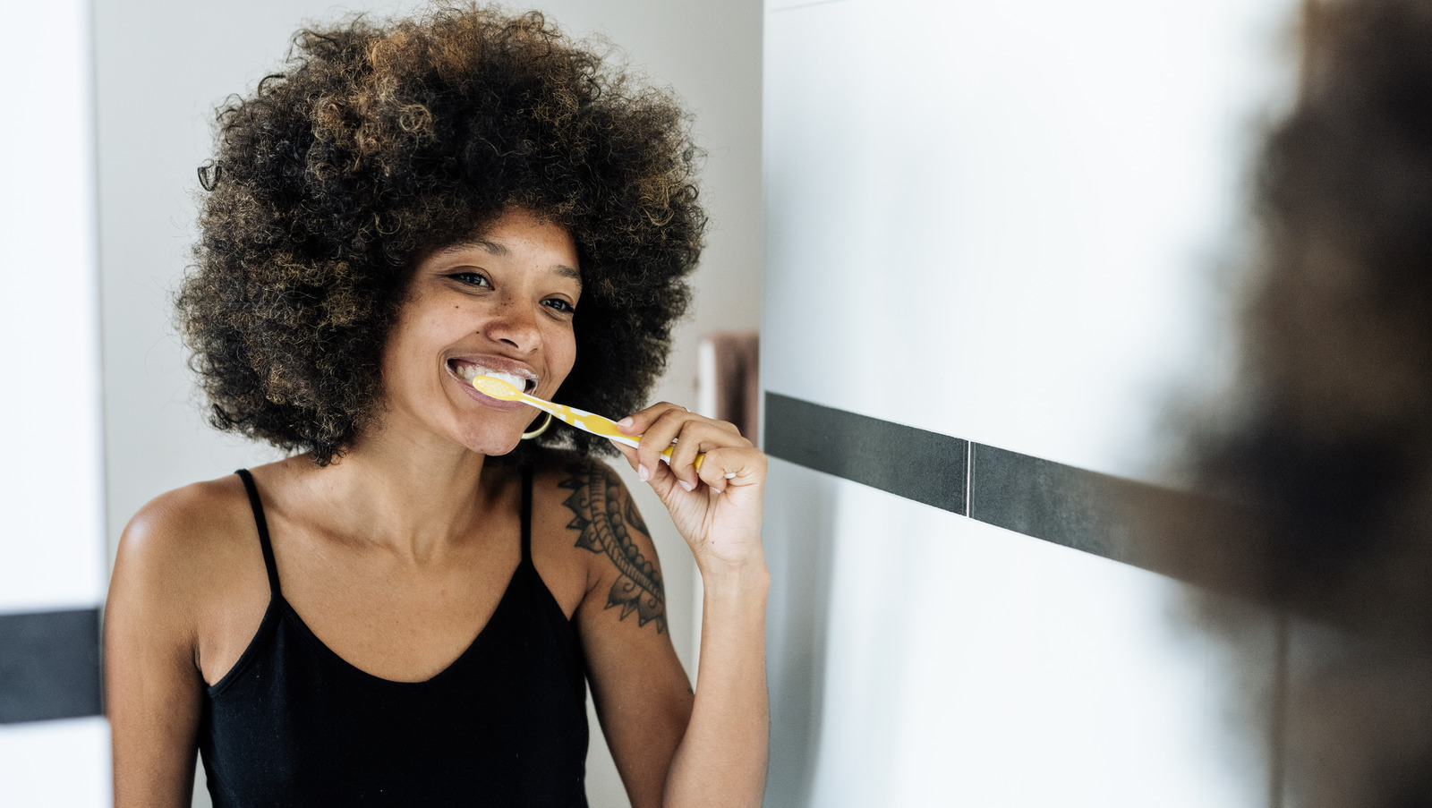 Our Best Tips For Getting Annoying Toothpaste Stains Out Of Your Clothes