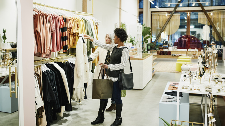 Woman shopping for coats