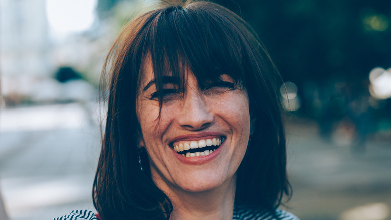 Woman with long bangs