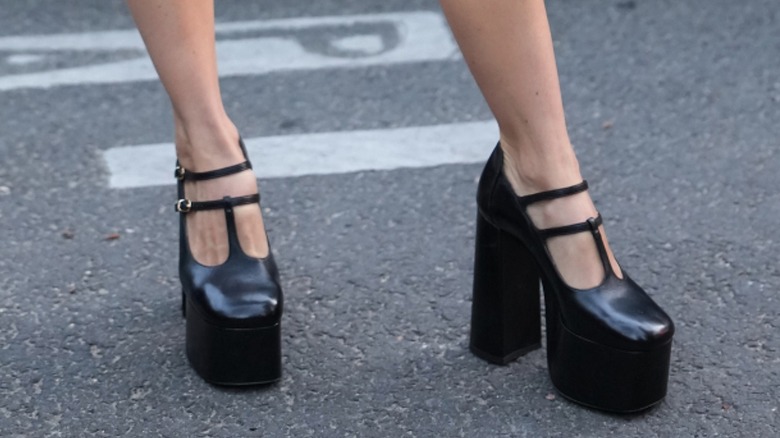 A person wearing chunky platform shoes