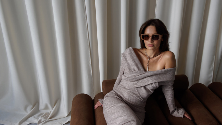Woman wearing gray outfit